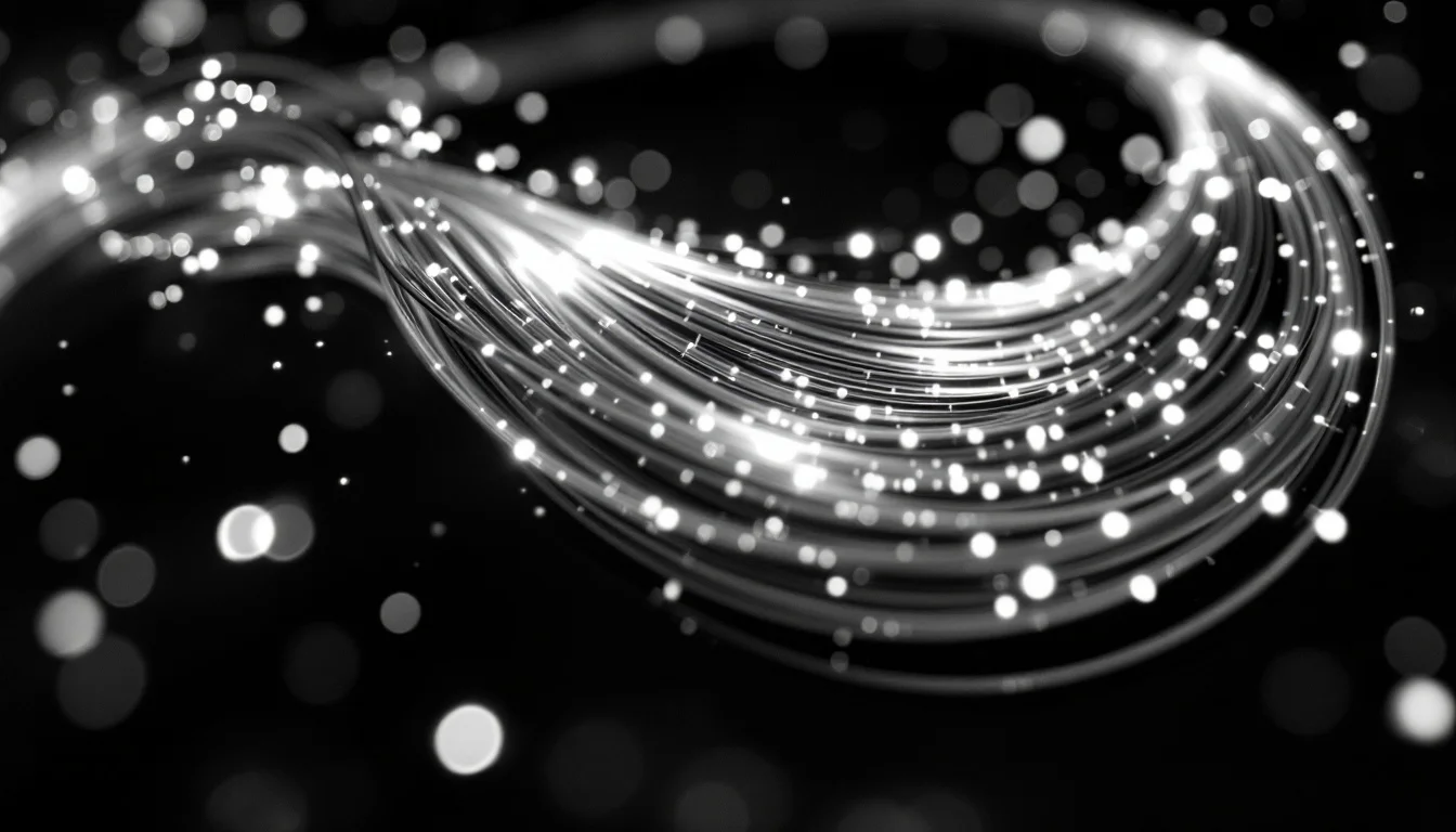 Editorial illustration: A coiled fiber optic cable illuminated from within, glowing with warm light against deep shadow, its — MonstarX